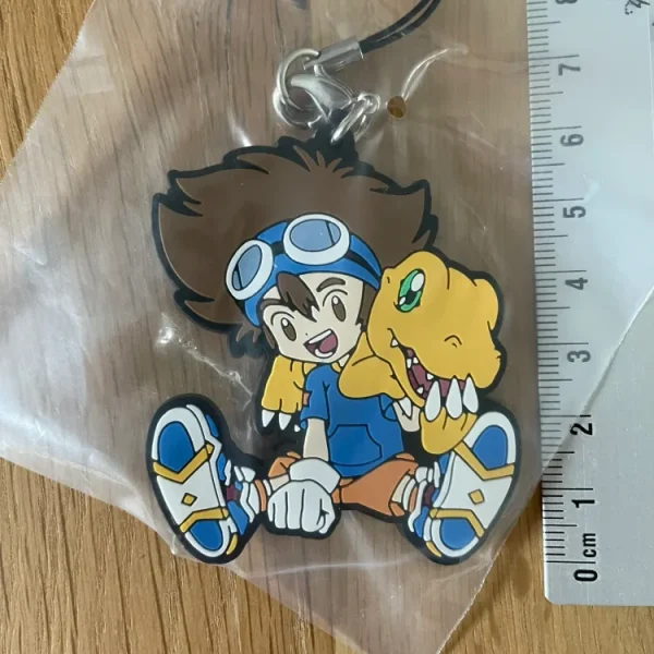 Digimon – Porte-clés caoutchouc Agumon & Taichi Ichiban Kuji 5 cm Bandai Spirits