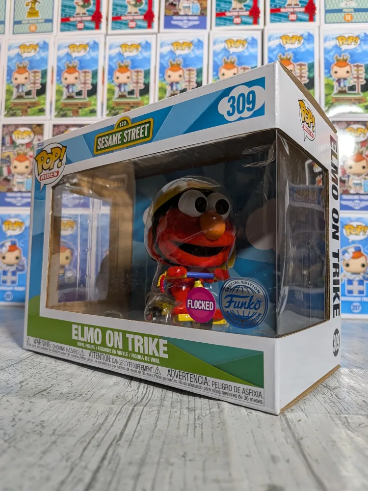 Funko pop Sesame Street #309 - Elmo on Trike (Flocked)